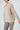 Detailed close-up of Albani Cashmere Pullover Sphinx fabric — fine cashmere knit in elegant beige-grey tone.