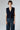 Front view of Dolci Cable Cashmere Vest Cardigan — navy Italian cashmere with sculptural cable-knit texture and button closure.