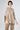 Close-up of V-neckline of Garda Cashmere Poncho — refined finish in soft beige cashmere.