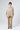 Front view of Garda Cashmere Poncho — beige Italian cashmere knit with V-neck and cable detail.