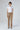 Front view of Gil Suede Trousers Grey Taupe — Italian-made suede trousers in warm grey-beige tone with elastic waistband.